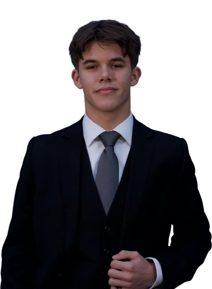 Keelan Arnold in a black three-piece suit